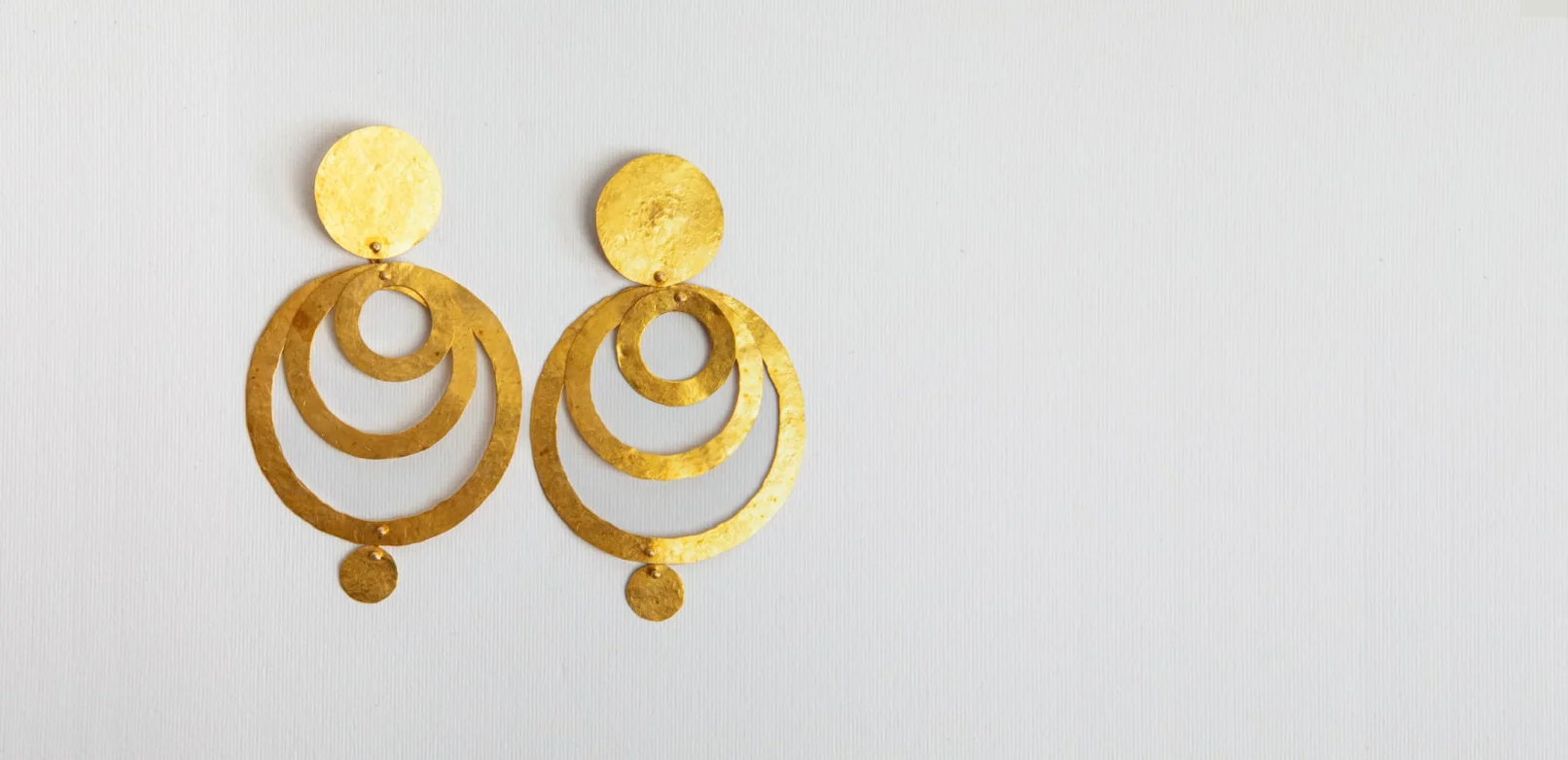 Mini Hoop Earrings in White Gold with Rubies